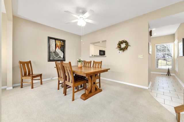 1622 Castle Hill Ln, Fort Wright, KY 41011 - dining space with ceiling fan, light carpet, baseboards, and light tile patterned floors