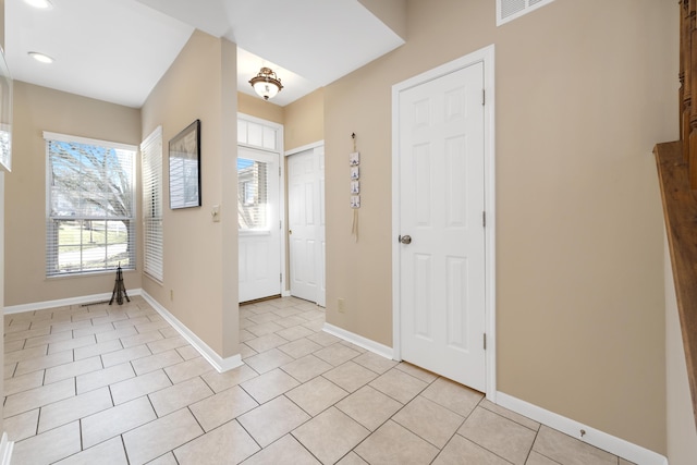 1622 Castle Hill Ln, Fort Wright, KY 41011 - entrance foyer featuring baseboards, light tile patterned flooring, and recessed lighting