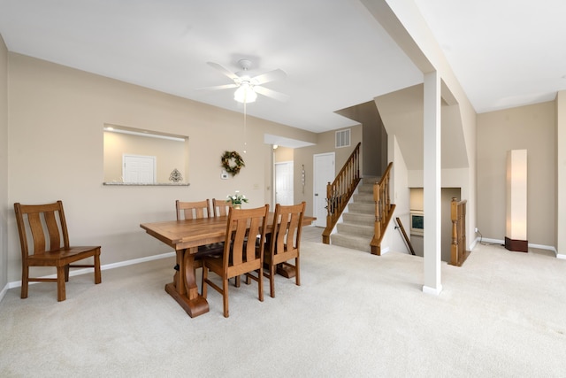 1622 Castle Hill Ln, Fort Wright, KY 41011 - carpeted dining area with stairway, a ceiling fan, and baseboards