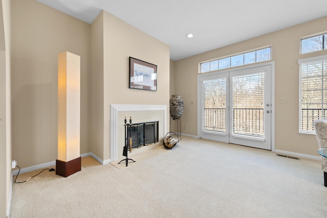 1622 Castle Hill Ln, Fort Wright, KY 41011 - carpeted living room with a fireplace with flush hearth and baseboards