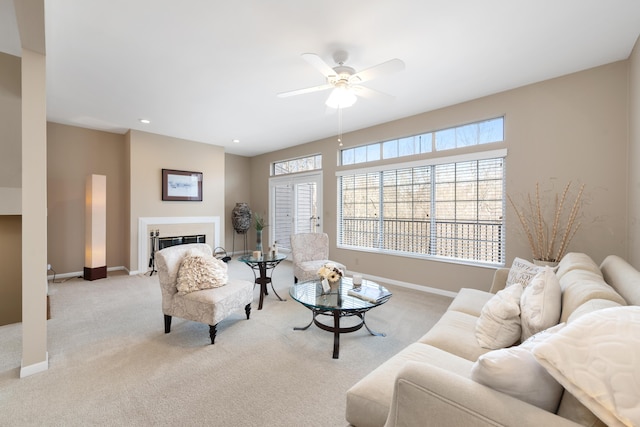 1622 Castle Hill Ln, Fort Wright, KY 41011 - carpeted living area featuring baseboards, ceiling fan, a glass covered fireplace, and recessed lighting