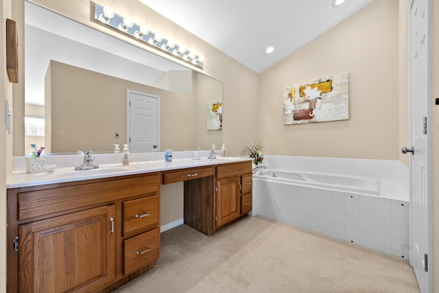 1622 Castle Hill Ln, Fort Wright, KY 41011 - bathroom featuring double vanity, a bath, lofted ceiling, carpet floors, and recessed lighting