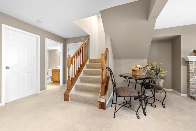 1622 Castle Hill Ln, Fort Wright, KY 41011 - stairs with carpet floors, baseboards, and a fireplace