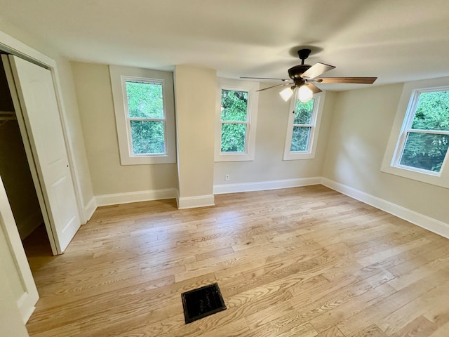 503 W 13th St, Newport, KY 41071 - unfurnished bedroom with light wood-style flooring, baseboards, and ceiling fan