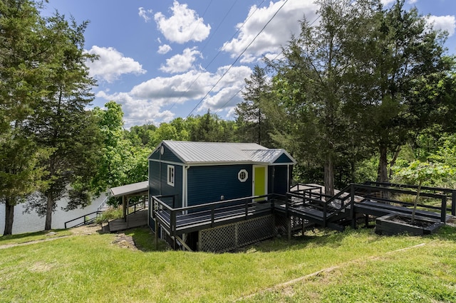 310 Greene Rd, Williamstown, KY 41097 - rear view of property with a lawn, metal roof, and a deck
