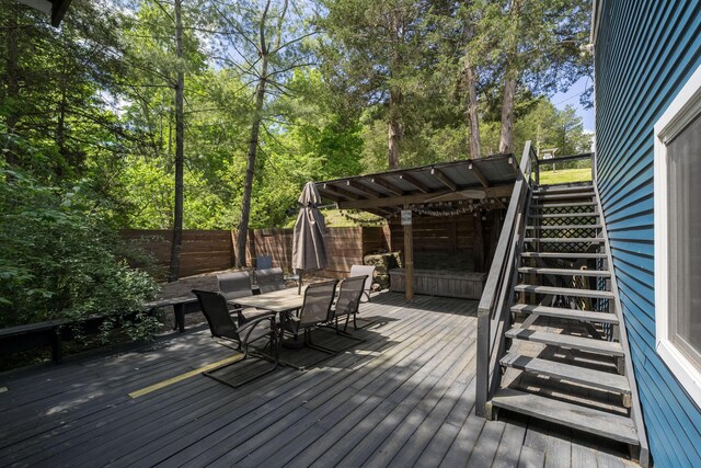 310 Greene Rd, Williamstown, KY 41097 - deck with stairs, a fenced backyard, and outdoor dining space