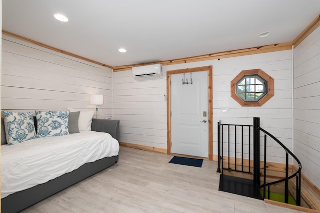 310 Greene Rd, Williamstown, KY 41097 - bedroom with a wall unit AC, wooden walls, wood finished floors, baseboards, and recessed lighting