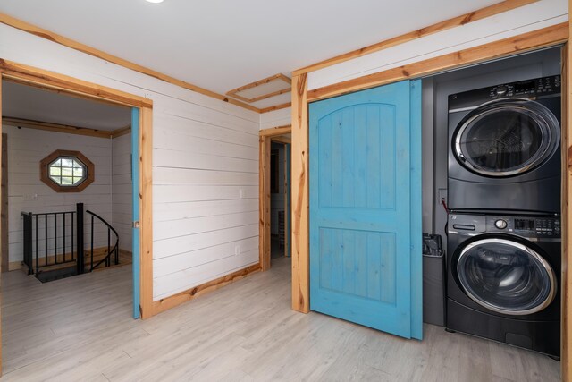 310 Greene Rd, Williamstown, KY 41097 - washroom with stacked washer / dryer, wood finished floors, and wooden walls