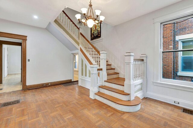 274 Ward Ave, Bellevue, KY 41073 - stairway featuring baseboards, a chandelier, and recessed lighting