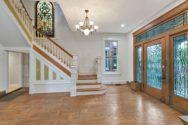 274 Ward Ave, Bellevue, KY 41073 - entrance foyer with stairway, a chandelier, baseboards, and recessed lighting
