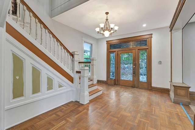 274 Ward Ave, Bellevue, KY 41073 - entryway with a chandelier, stairway, baseboards, and recessed lighting