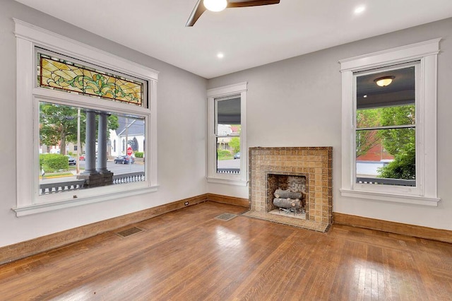 274 Ward Ave, Bellevue, KY 41073 - unfurnished living room featuring ceiling fan, wood finished floors, baseboards, recessed lighting, and a brick fireplace