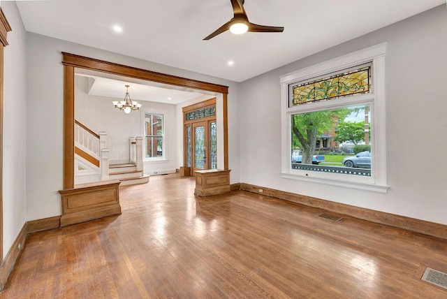 274 Ward Ave, Bellevue, KY 41073 - empty room with healthy amount of natural light, wood finished floors, and baseboards