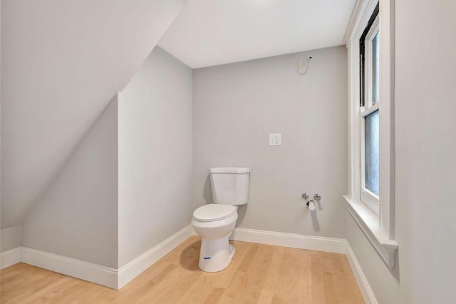 274 Ward Ave, Bellevue, KY 41073 - bathroom featuring wood finished floors, toilet, and baseboards