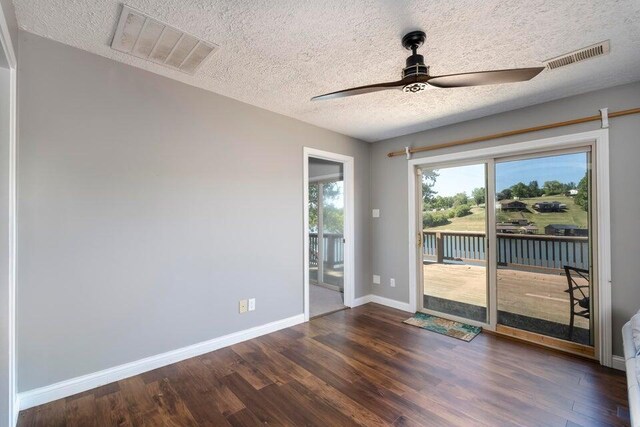 510 Jacob Dr, Williamstown, KY 41097 - spare room featuring ceiling fan, a textured ceiling, wood finished floors, and baseboards