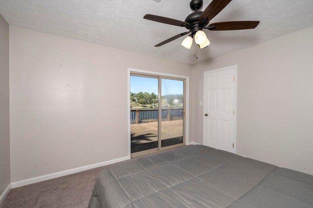 510 Jacob Dr, Williamstown, KY 41097 - bedroom featuring access to exterior, a water view, baseboards, dark colored carpet, and ceiling fan