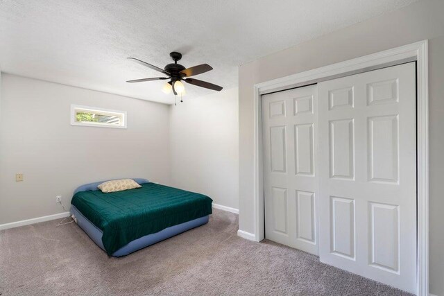 510 Jacob Dr, Williamstown, KY 41097 - bedroom featuring baseboards, carpet flooring, a closet, and ceiling fan