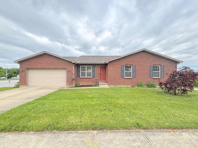 26 Nicholson Ave, Walton, KY 41094 - single story home featuring brick siding, an attached garage, concrete driveway, and a front lawn