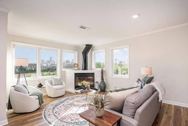 902 Vernon Pl, Covington, KY 41016 - living room with crown molding, healthy amount of natural light, wood finished floors, and baseboards