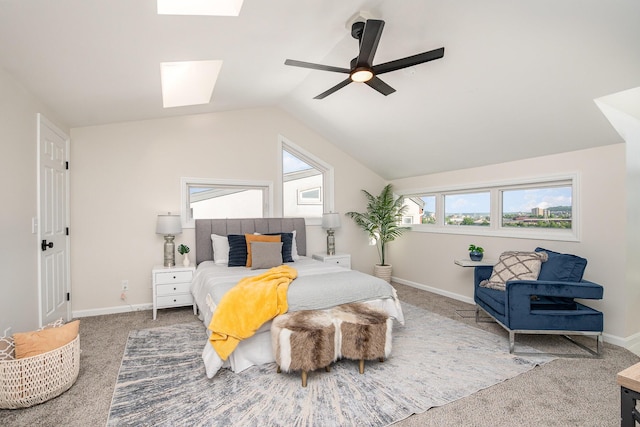902 Vernon Pl, Covington, KY 41016 - carpeted bedroom featuring a skylight, vaulted ceiling, baseboards, and ceiling fan