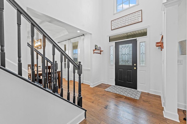 4800 Brewer Ln, Petersburg, KY 41080 - foyer entrance with wood-type flooring, baseboards, stairs, and a high ceiling