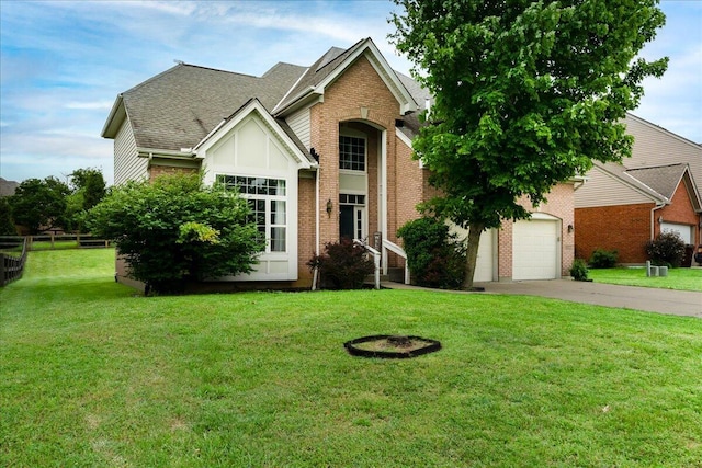11332 Sheffield Ln, Walton, KY 41094 - traditional-style house featuring driveway, brick siding, a front lawn, and a shingled roof