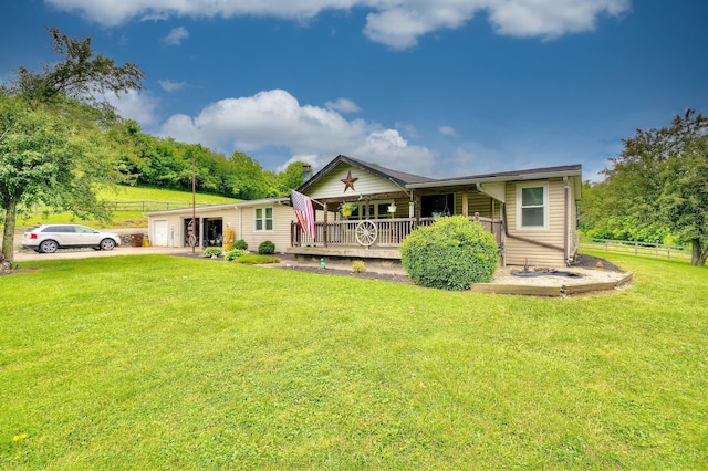 12085 Dickerson Rd, Walton, KY 41094 - rear view of house with covered porch and concrete driveway