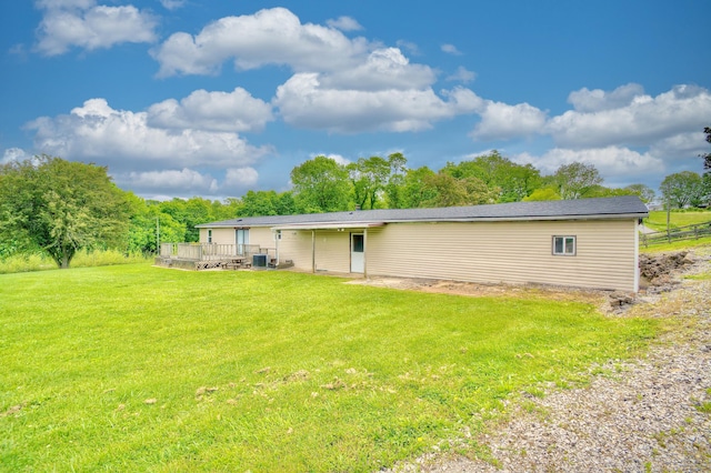 12085 Dickerson Rd, Walton, KY 41094 - back of property featuring a yard, a wooden deck, and central air condition unit