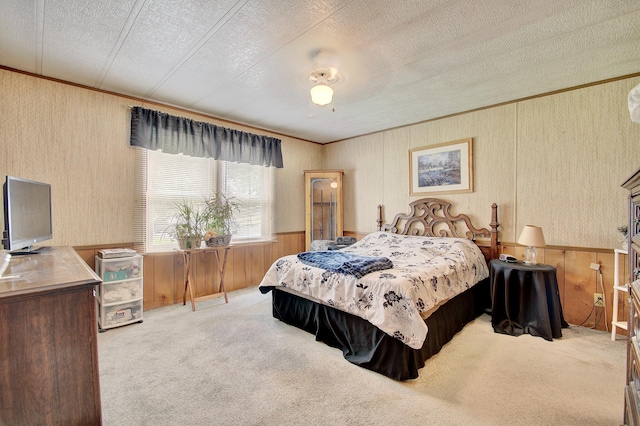 12085 Dickerson Rd, Walton, KY 41094 - carpeted bedroom featuring a textured ceiling, ornamental molding, wood walls, wainscoting, and wallpapered walls
