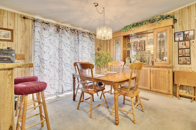 12085 Dickerson Rd, Walton, KY 41094 - dining space with wooden walls, a chandelier, light carpet, and crown molding