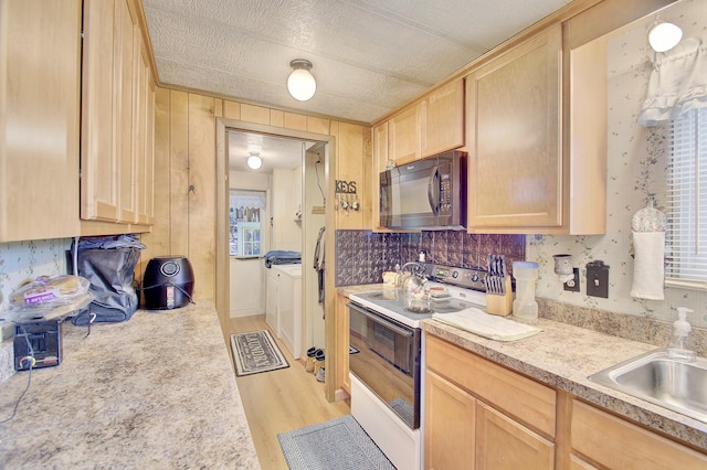 12085 Dickerson Rd, Walton, KY 41094 - kitchen featuring black microwave, white electric stove, light brown cabinetry, light countertops, and light wood-style floors