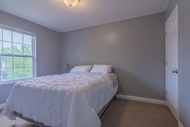 2780 Berwood Ln, Hebron, KY 41048 - carpeted bedroom featuring baseboards and crown molding