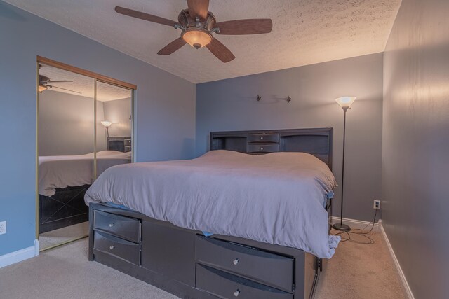 2780 Berwood Ln, Hebron, KY 41048 - carpeted bedroom with a textured ceiling, a closet, and ceiling fan