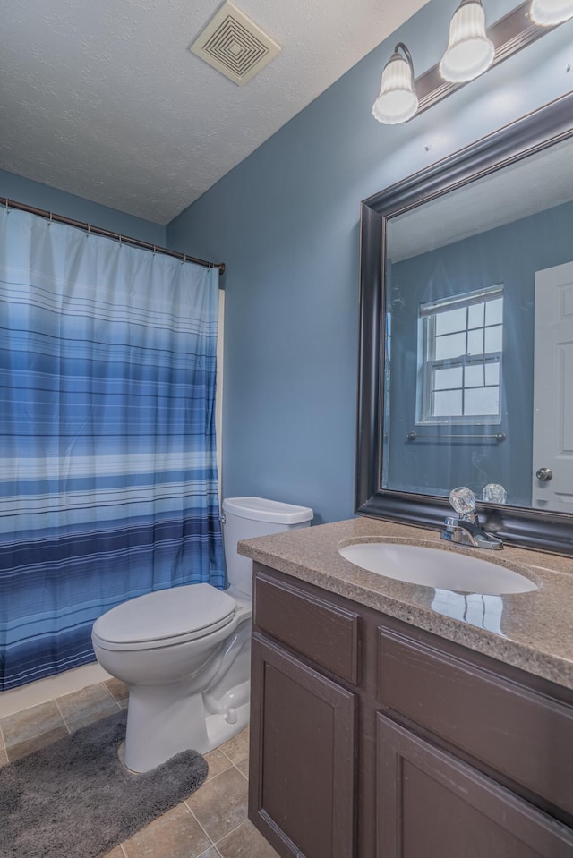 2780 Berwood Ln, Hebron, KY 41048 - bathroom featuring vanity, a textured ceiling, tile patterned floors, and a shower with shower curtain