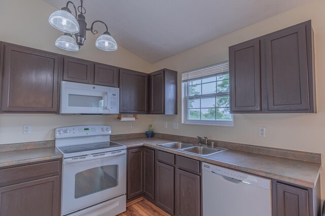 2780 Berwood Ln, Hebron, KY 41048 - kitchen with white appliances, vaulted ceiling, and light wood-style floors