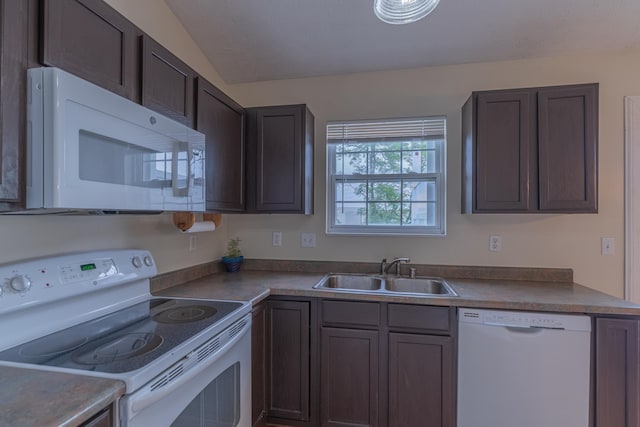 2780 Berwood Ln, Hebron, KY 41048 - kitchen with white appliances and dark brown cabinets