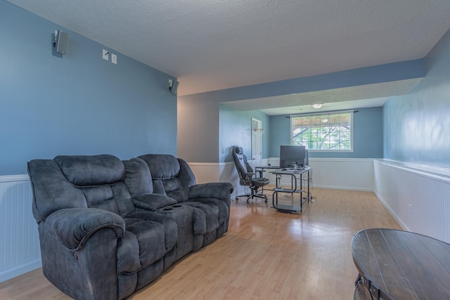2780 Berwood Ln, Hebron, KY 41048 - living area with light wood-type flooring, wainscoting, a desk, and a textured ceiling