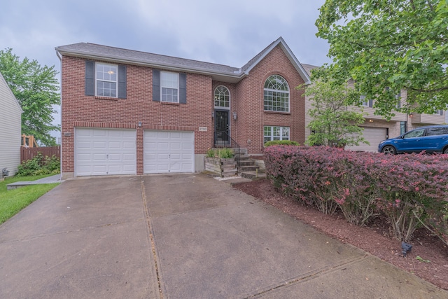2780 Berwood Ln, Hebron, KY 41048 - view of front of house with an attached garage, brick siding, and concrete driveway