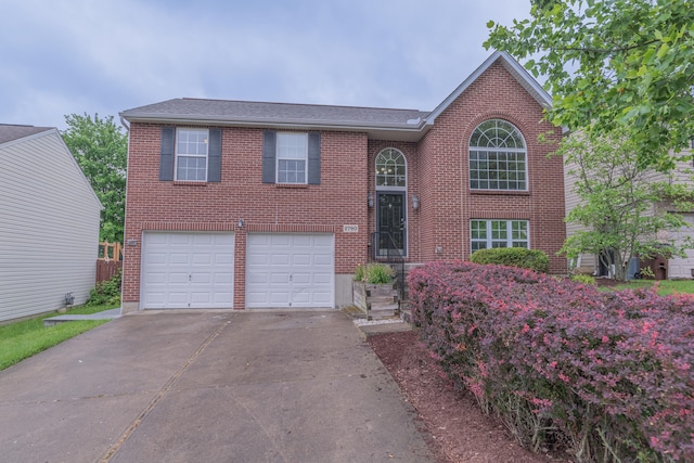 2780 Berwood Ln, Hebron, KY 41048 - view of front of home with brick siding, an attached garage, driveway, and roof with shingles