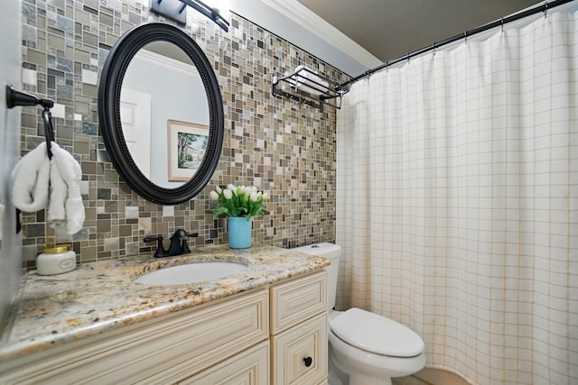 2642 Sterling Trce, Burlington, KY 41005 - full bathroom featuring ornamental molding, toilet, vanity, tasteful backsplash, and tile walls