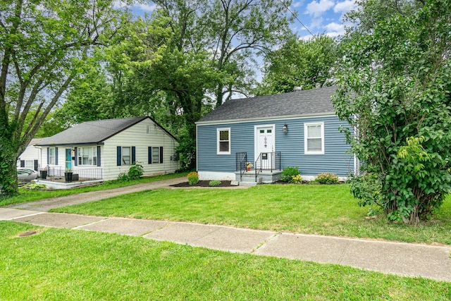 2530 Avon Dr, Crescent Park, KY 41017 - view of front facade with a front yard and a shingled roof