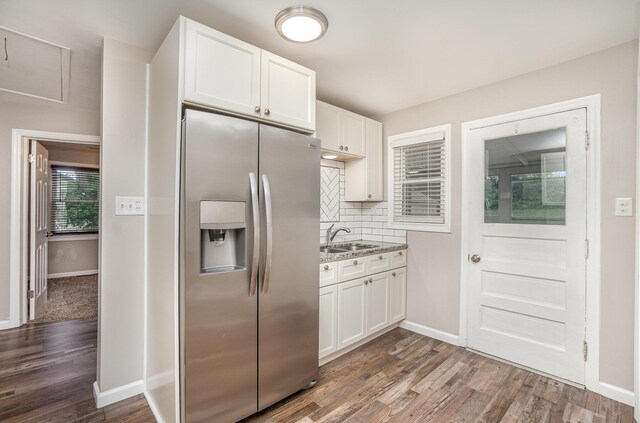 2530 Avon Dr, Crescent Park, KY 41017 - kitchen featuring stainless steel fridge, a sink, white cabinetry, dark wood finished floors, and decorative backsplash