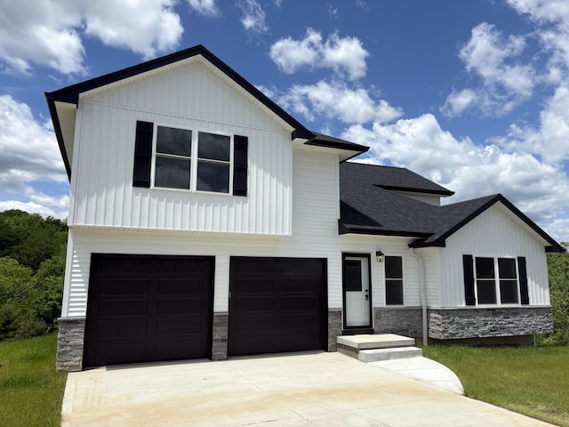 160 Saddlebrook Ln, Dry Ridge, KY 41035 - modern inspired farmhouse with stone siding, an attached garage, a shingled roof, driveway, and board and batten siding