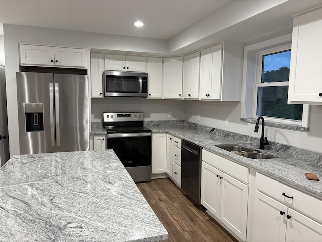 160 Saddlebrook Ln, Dry Ridge, KY 41035 - kitchen featuring stainless steel appliances, a sink, white cabinets, dark wood-type flooring, and light stone countertops