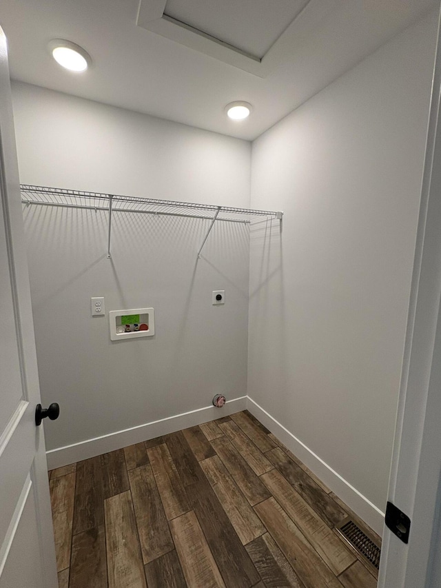 160 Saddlebrook Ln, Dry Ridge, KY 41035 - laundry room with hookup for an electric dryer, hookup for a washing machine, dark wood-style flooring, and baseboards