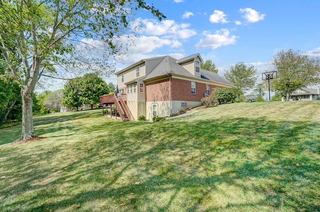 12002 Southridge Dr, Walton, KY 41094 - view of side of home featuring stairway, a deck, a yard, and brick siding