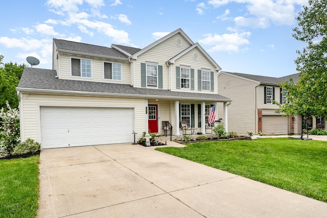 271 Macy Ct, Walton, KY 41094 - traditional-style house with covered porch, a front lawn, driveway, and a garage