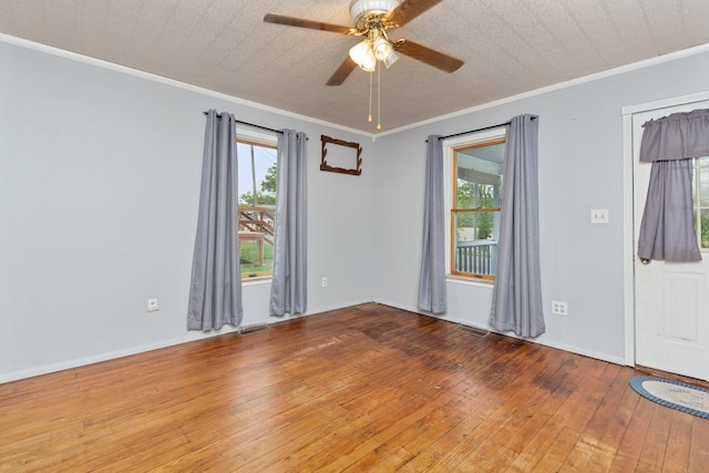 626 E 2nd St, Augusta, KY 41002 - empty room featuring ornamental molding, wood-type flooring, ceiling fan, and baseboards