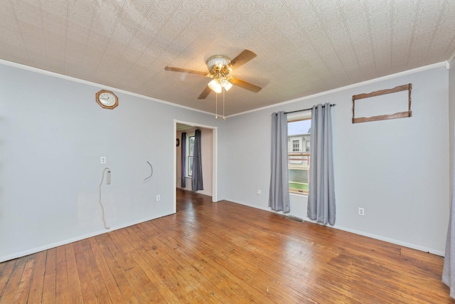 626 E 2nd St, Augusta, KY 41002 - spare room with a ceiling fan, light wood-type flooring, ornamental molding, baseboards, and an ornate ceiling