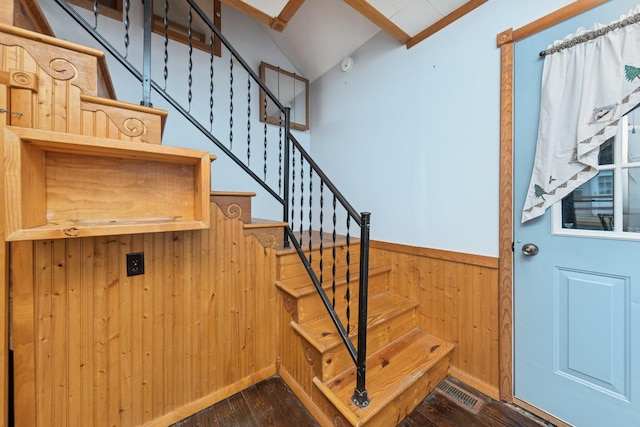 626 E 2nd St, Augusta, KY 41002 - stairway featuring wood walls, wood finished floors, a wainscoted wall, and vaulted ceiling